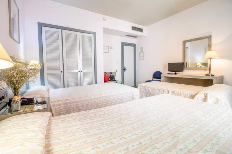 Habitación doble con cama extra (niño) Abades Manzanil 3* Hotel Loja