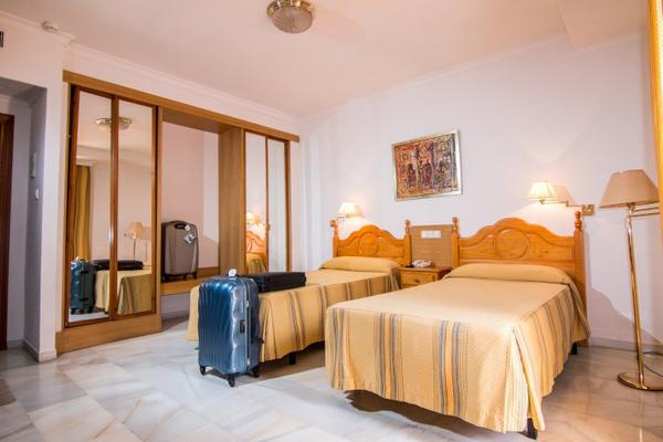Double room plus 2 extra bed (2 adult + 2 children) Abades Loja 3* Hotel in Loja Double room plus 2 extra bed (2 adult + 2 children) Abades Loja 3* Hotel in Loja